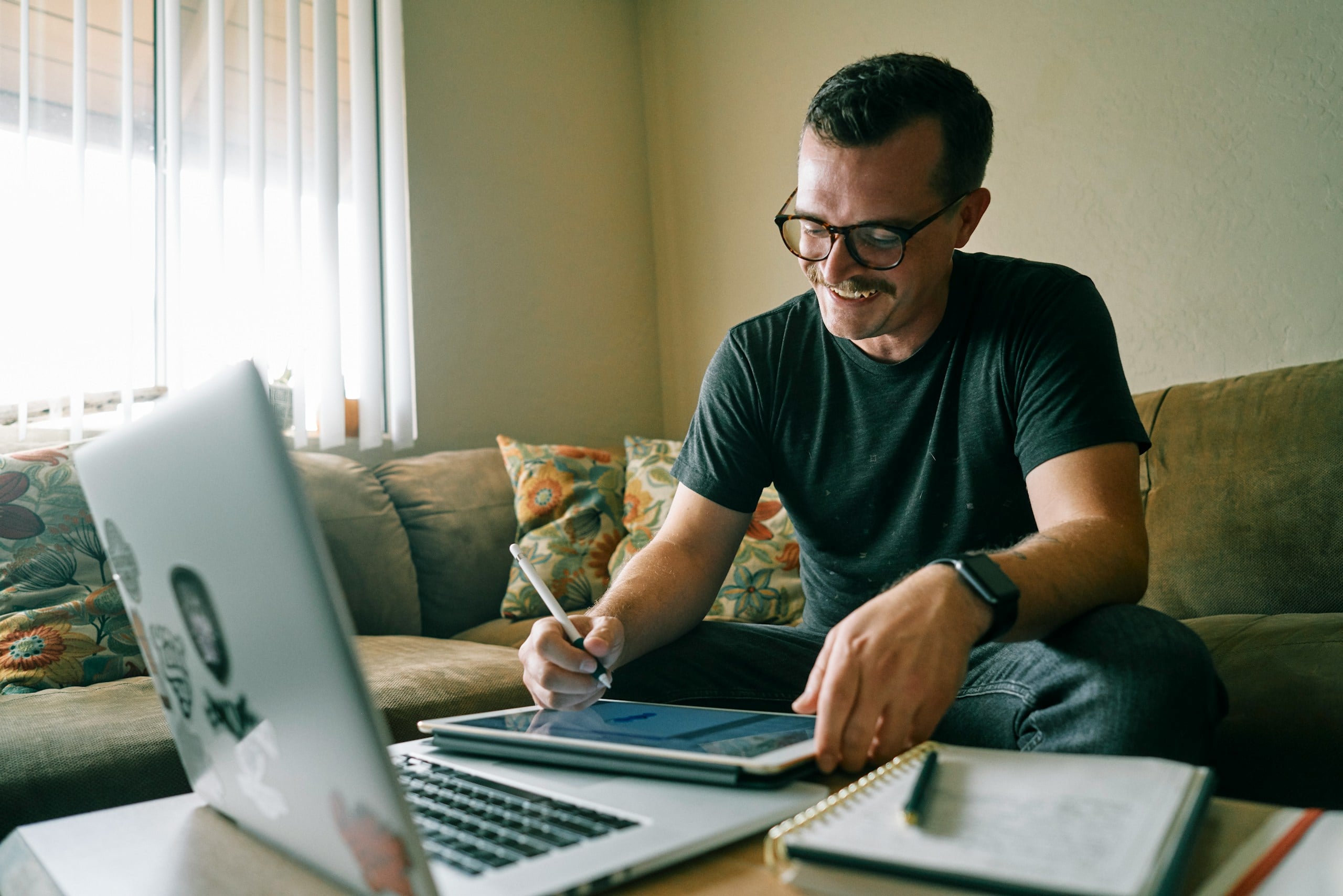 Man working in home office on computer