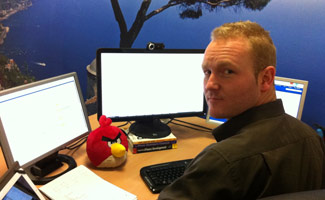 Peter Coppinger at desk